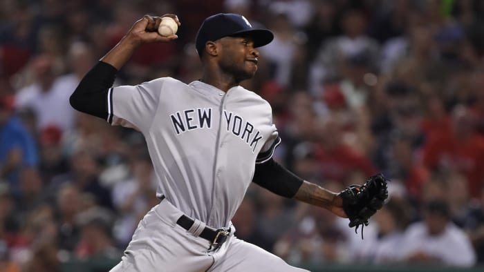 Domingo German pitches for the Yankees during a road game at Fenway Park.